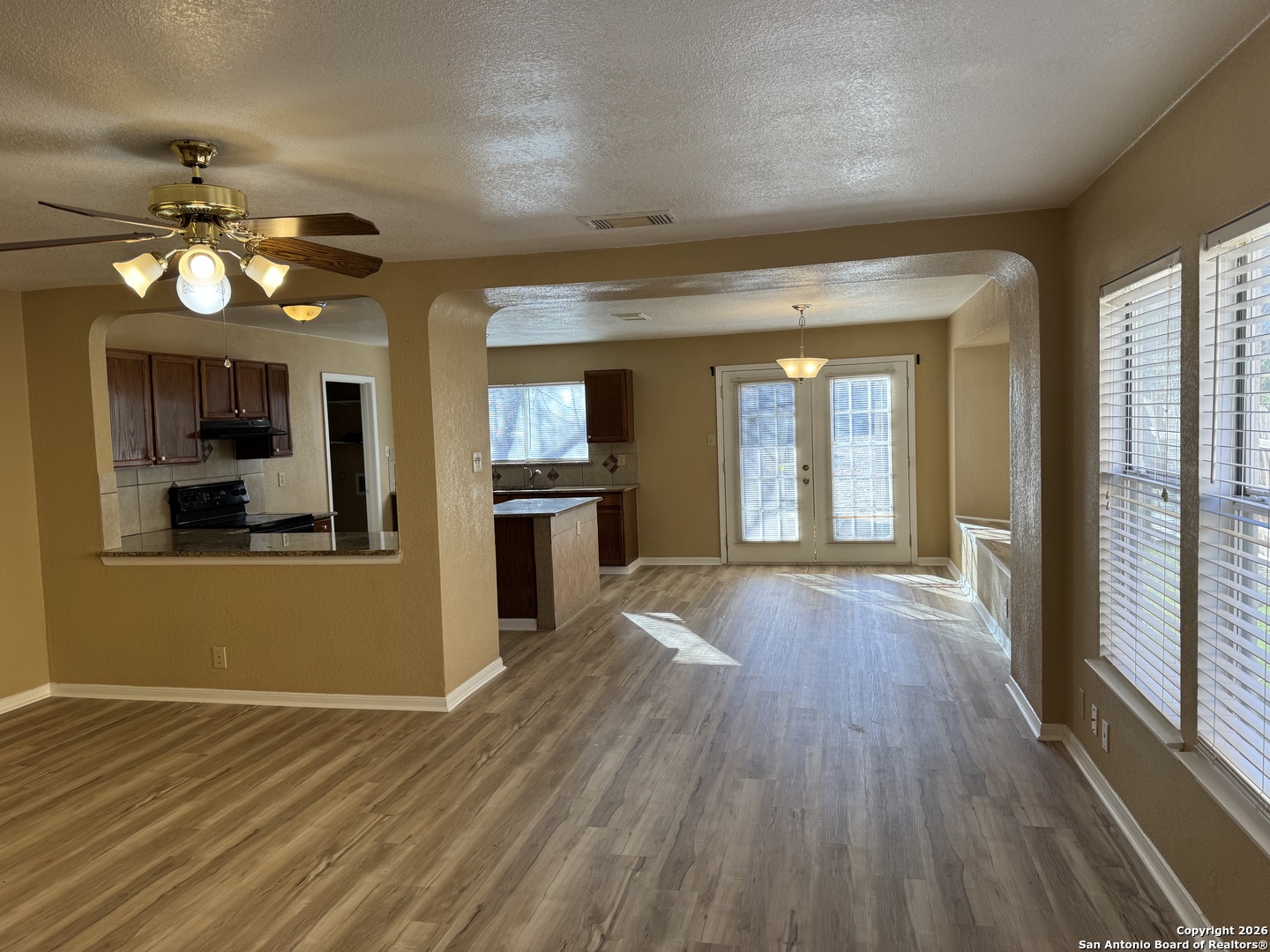 7315 Northallerton Converse, TX 78109 - Photo 5 of 22 wooden floor in an empty room with a window