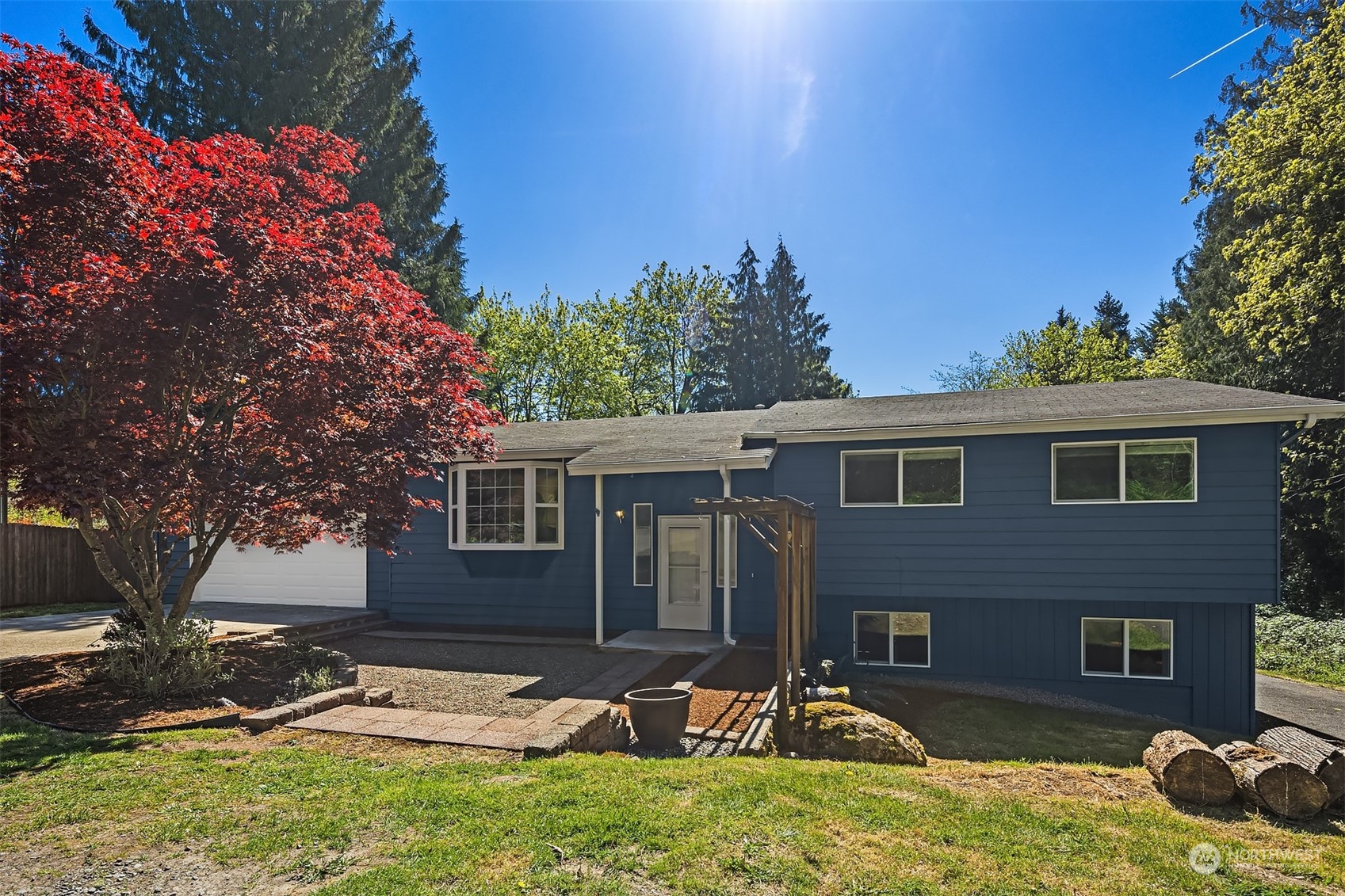 20211 Southeast 157th Street Renton, WA 98059 - Photo 1 of 38 a backyard of a house with table and chairs