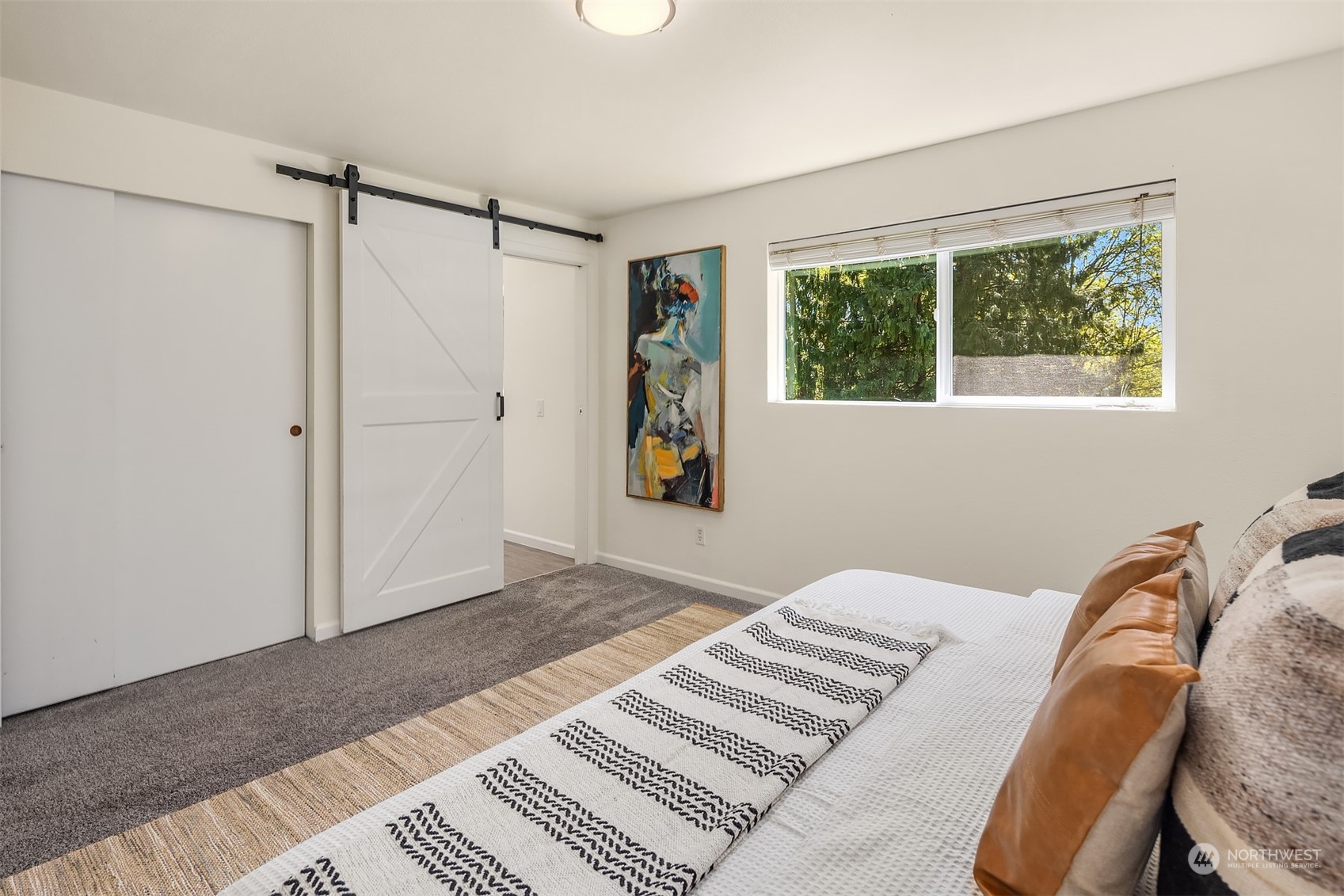 20211 Southeast 157th Street Renton, WA 98059 - Photo 13 of 38 a bedroom with a bed and a window