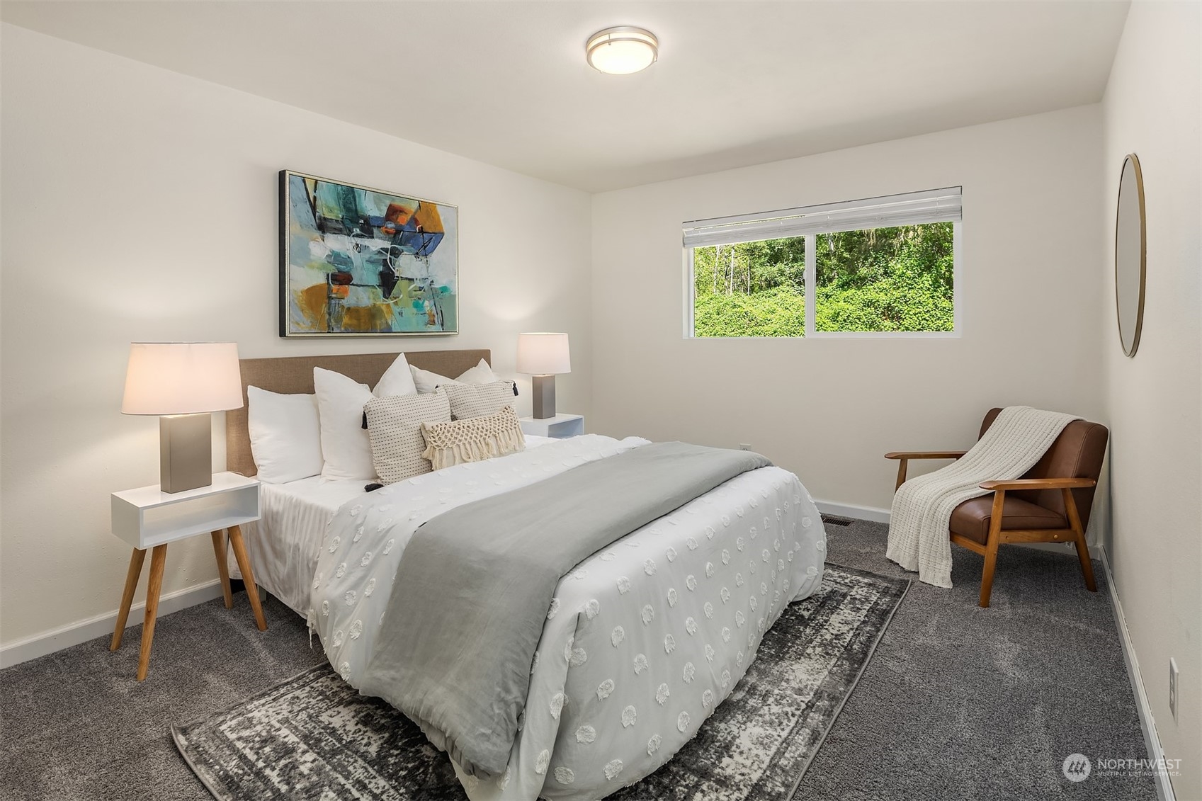 20211 Southeast 157th Street Renton, WA 98059 - Photo 16 of 38 a bedroom with bed and a window