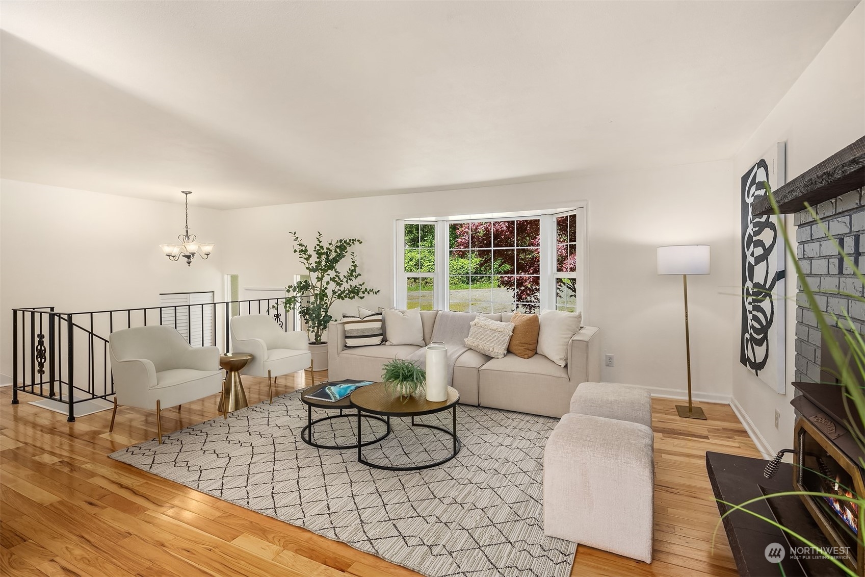 20211 Southeast 157th Street Renton, WA 98059 - Photo 2 of 38 a living room with furniture and a wooden floor
