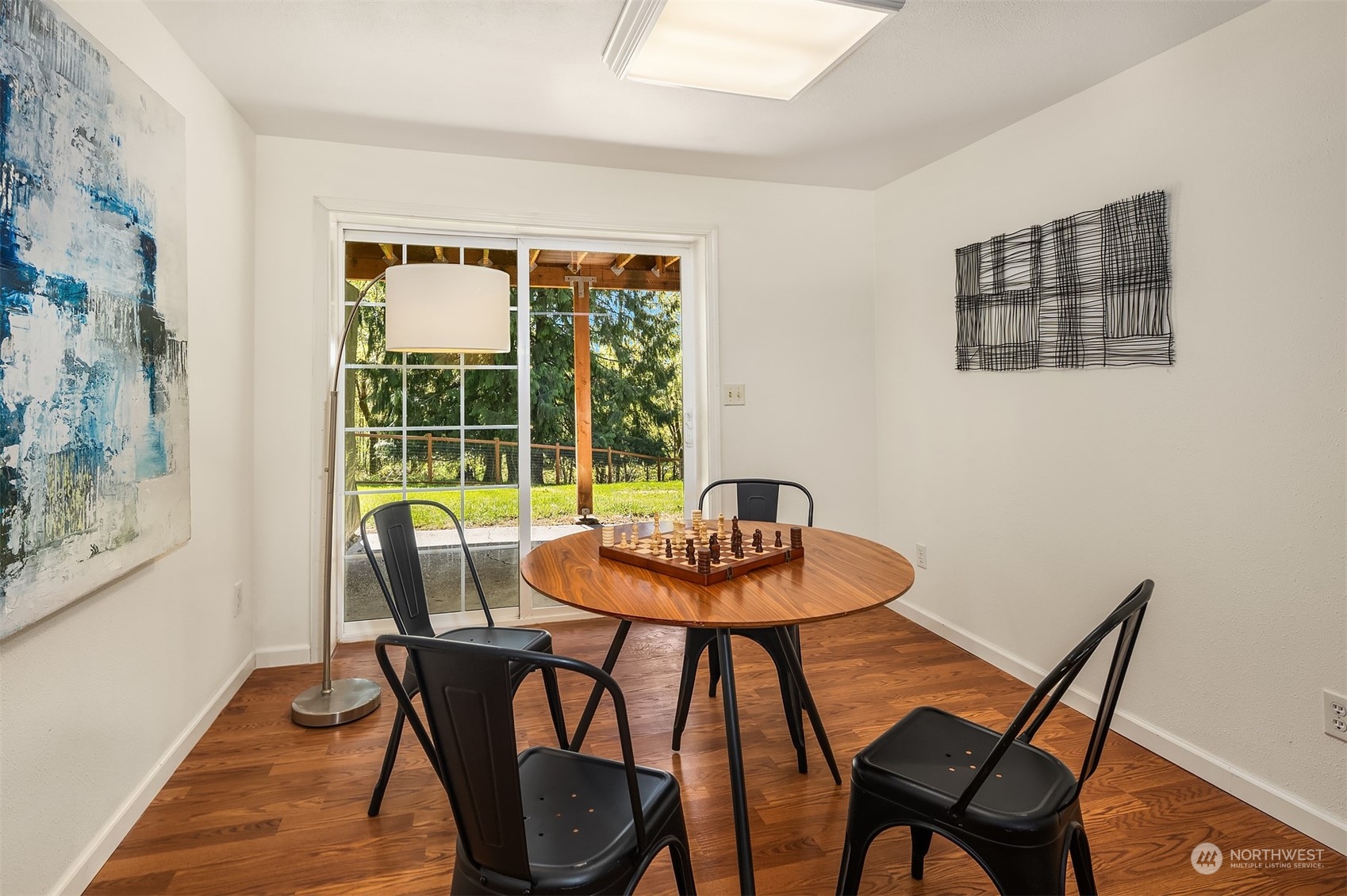 20211 Southeast 157th Street Renton, WA 98059 - Photo 21 of 38 a dining room with furniture and window
