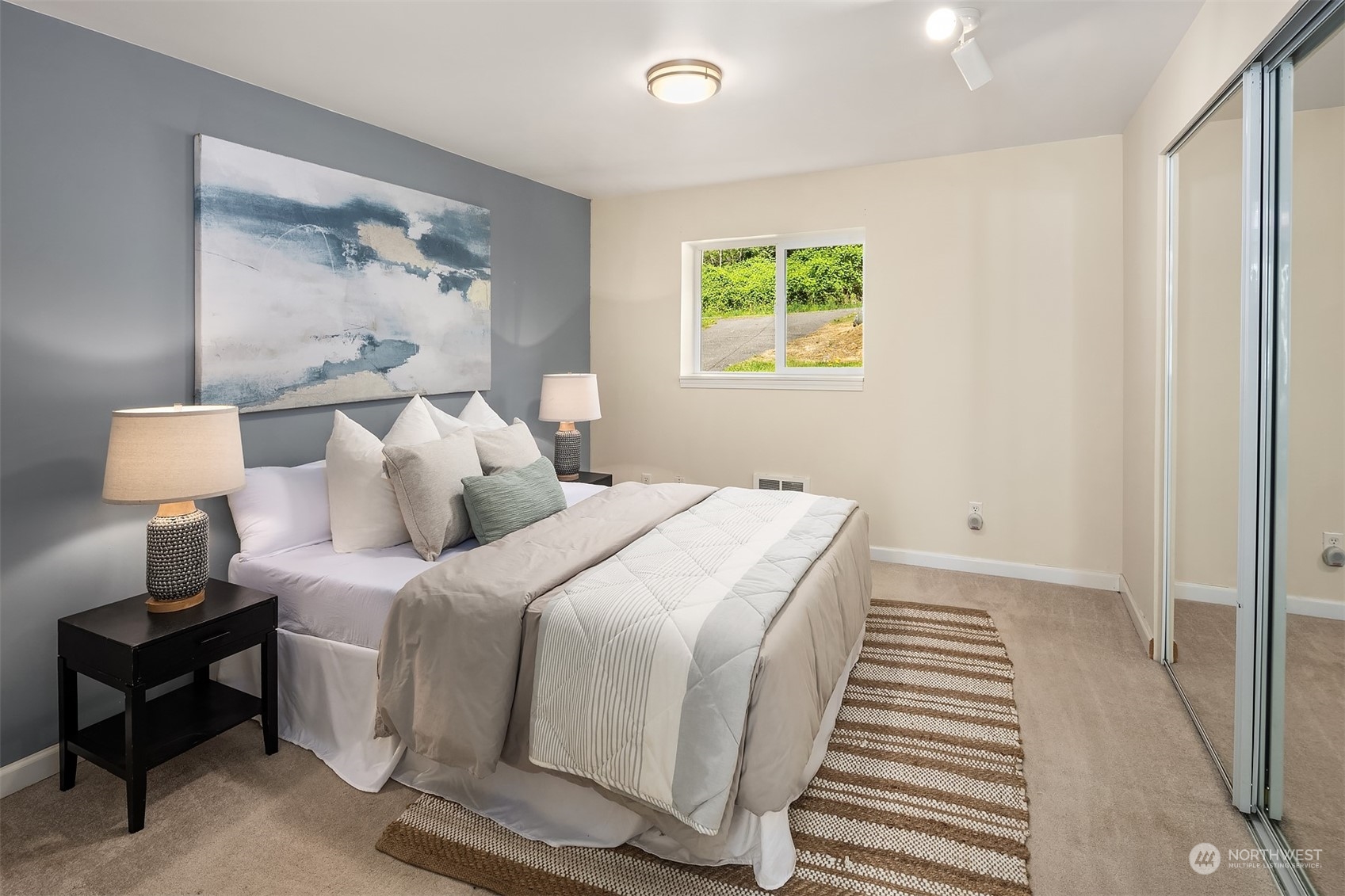 20211 Southeast 157th Street Renton, WA 98059 - Photo 26 of 38 a bedroom with bed and window