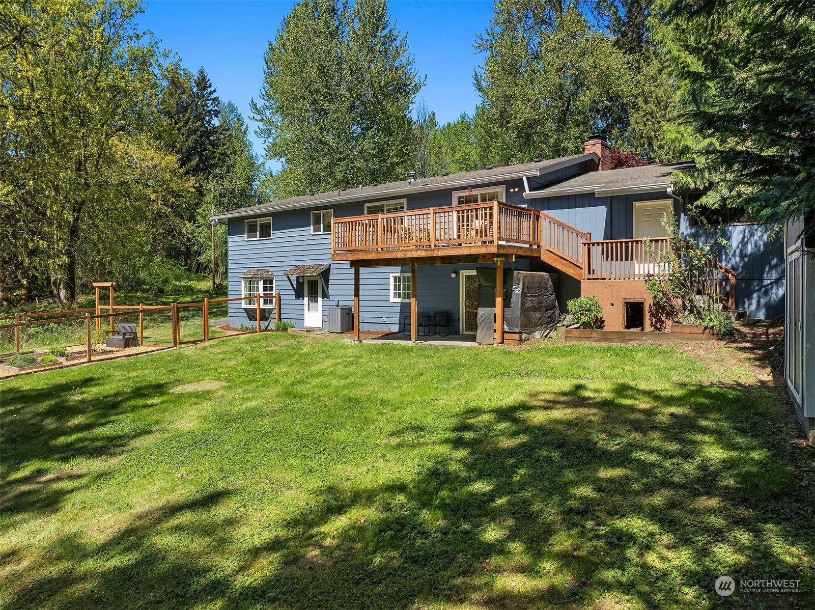 20211 Southeast 157th Street Renton, WA 98059 - Photo 31 of 38 a front view of a house with a yard