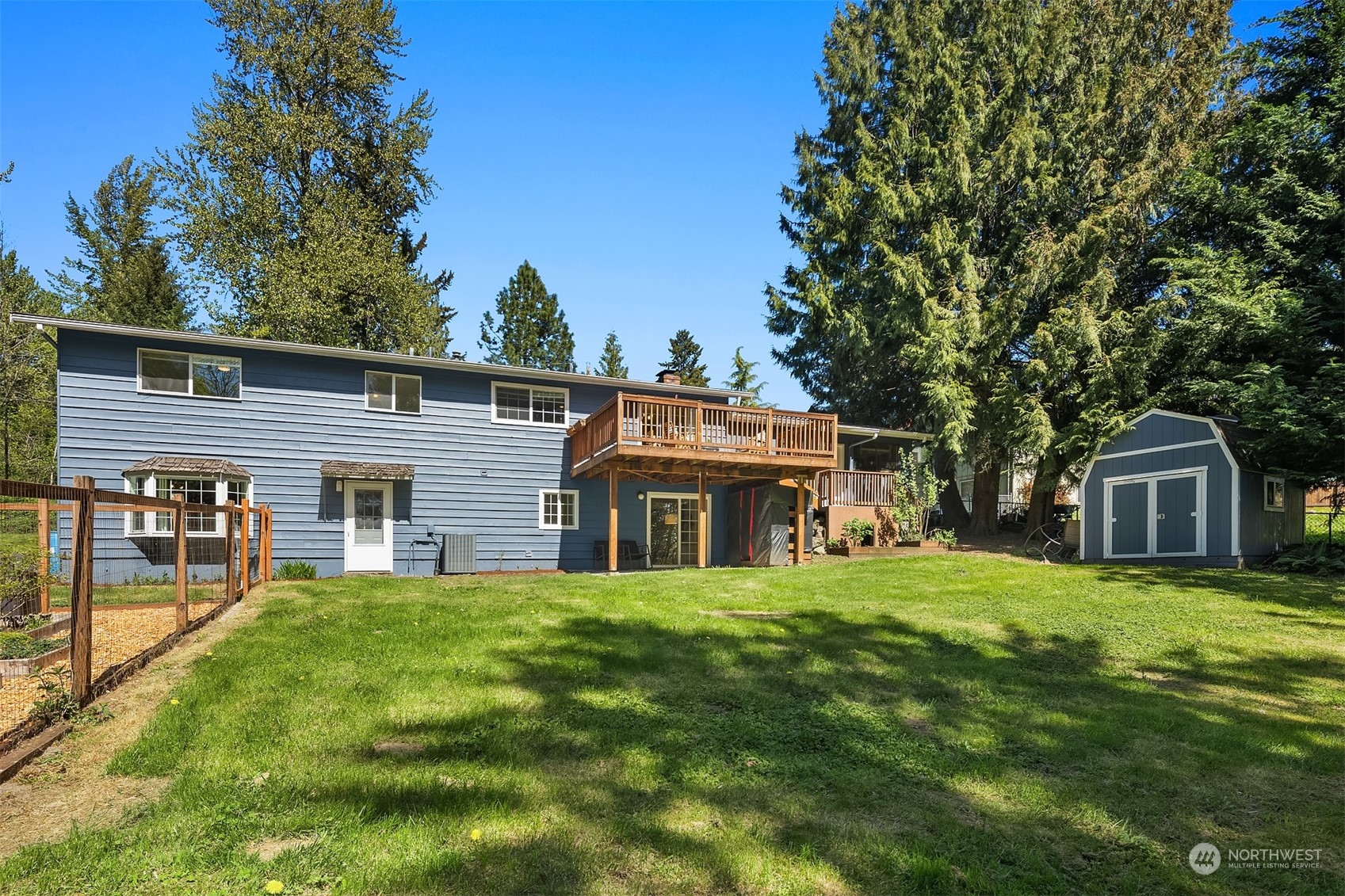 20211 Southeast 157th Street Renton, WA 98059 - Photo 32 of 38 a front view of house with yard and green space