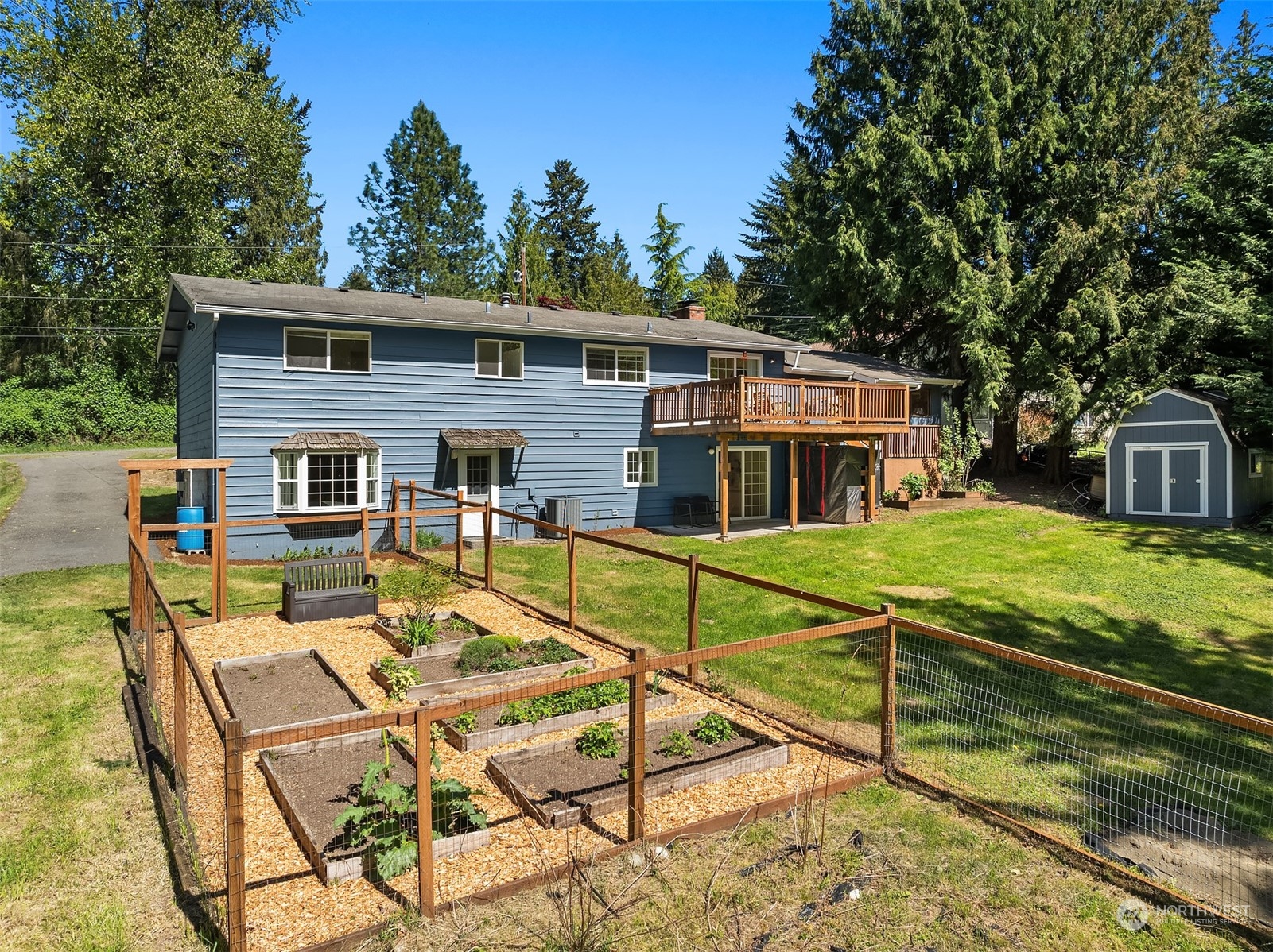 20211 Southeast 157th Street Renton, WA 98059 - Photo 33 of 38 a view of a house with backyard