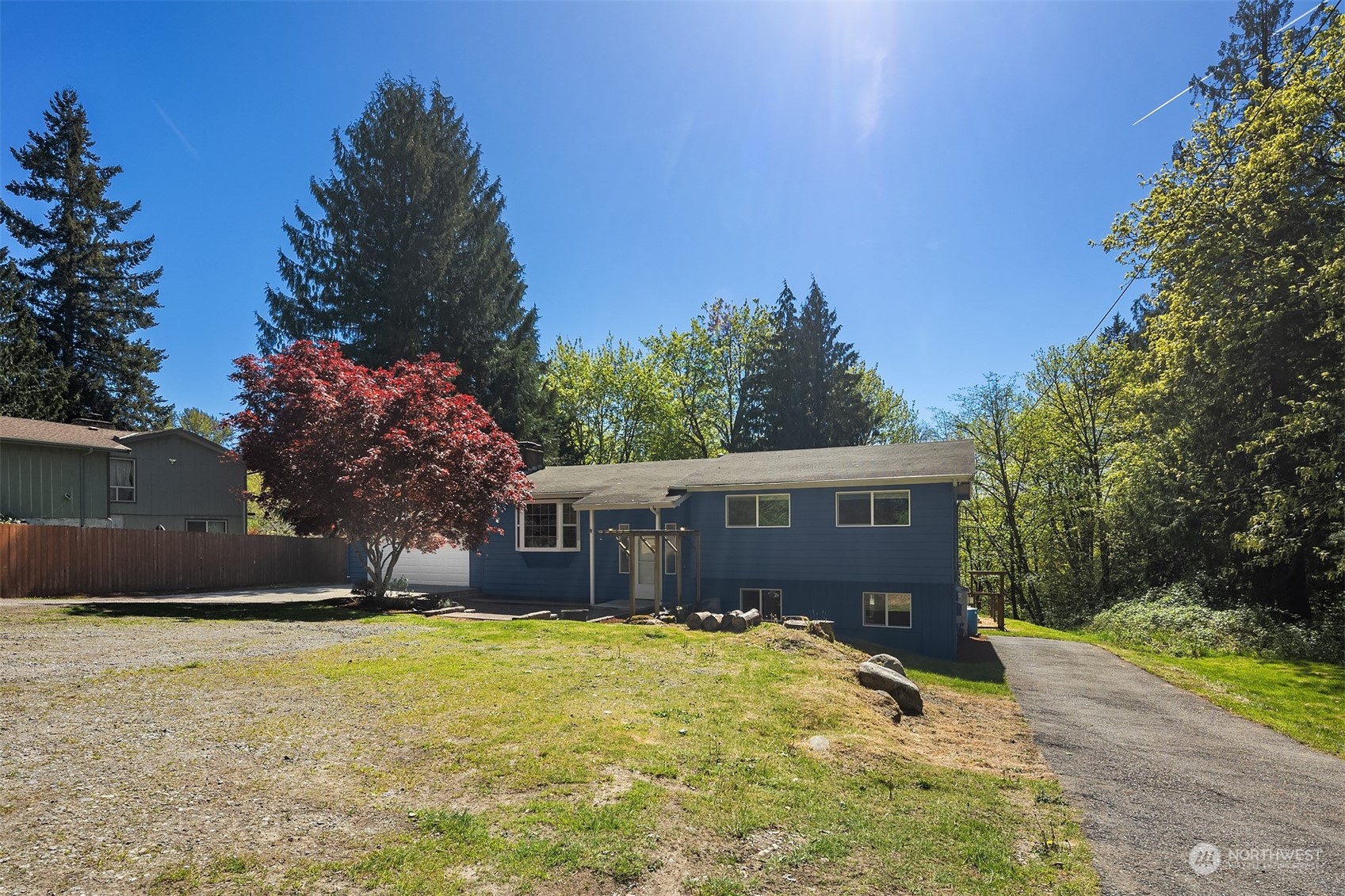 20211 Southeast 157th Street Renton, WA 98059 - Photo 38 of 38 a front view of a house with a yard