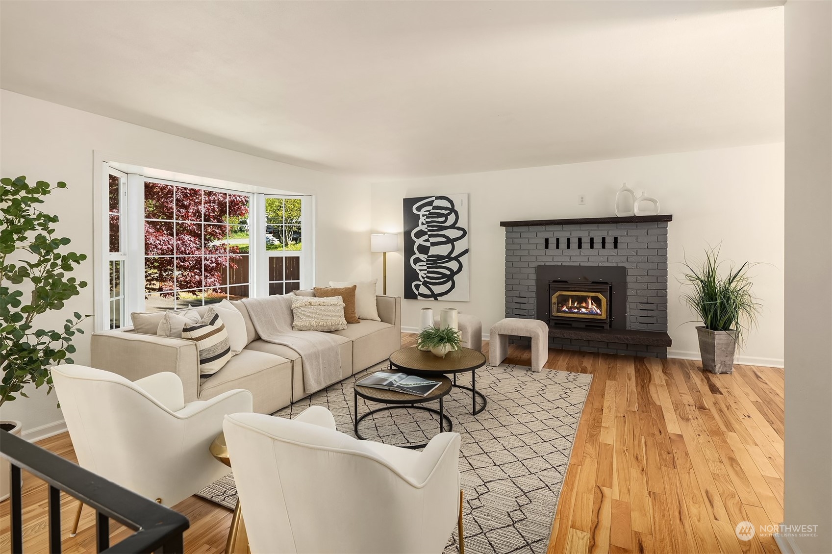20211 Southeast 157th Street Renton, WA 98059 - Photo 4 of 38 a living room with furniture and a fireplace