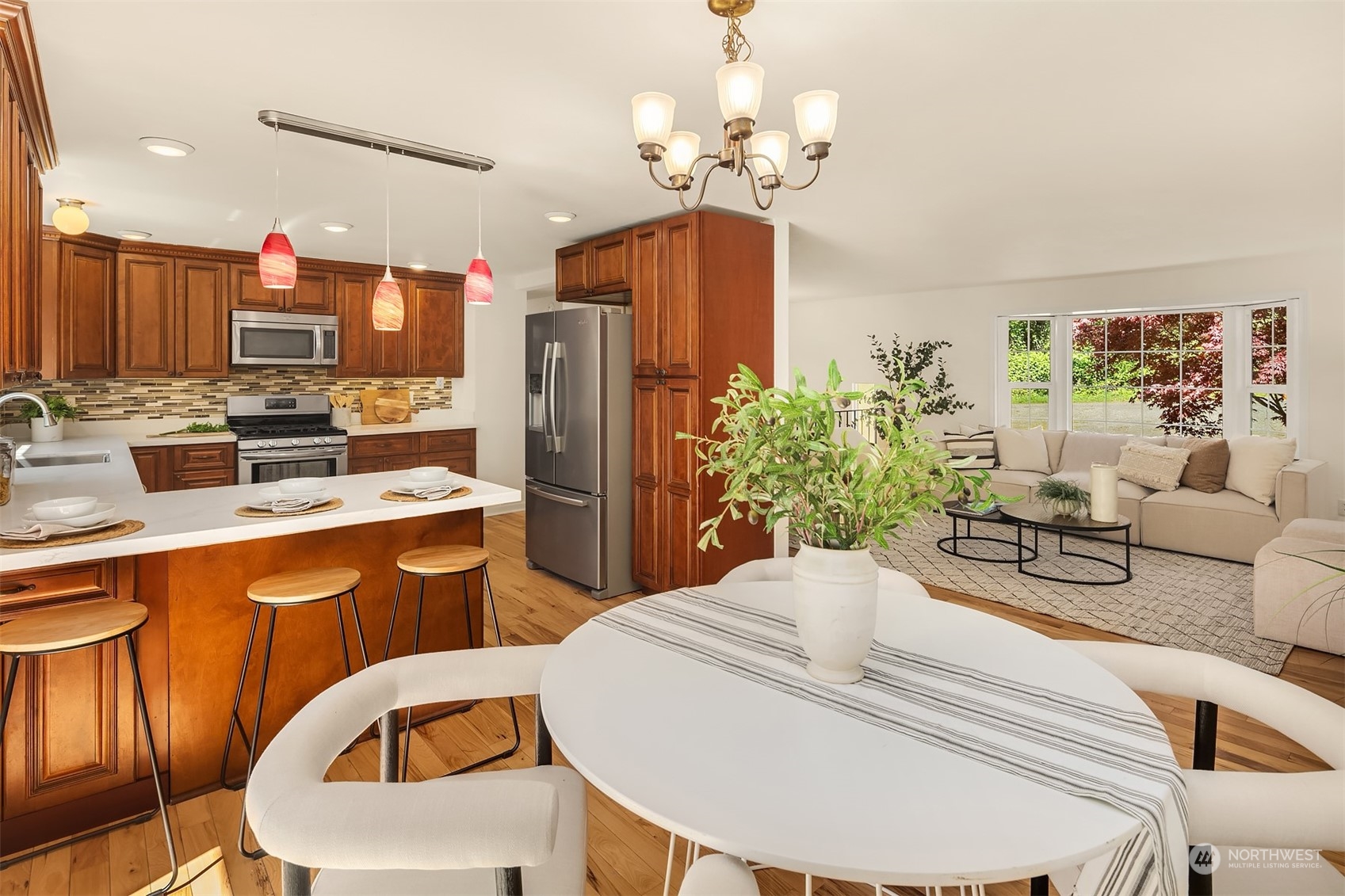 20211 Southeast 157th Street Renton, WA 98059 - Photo 6 of 38 a dining room with furniture a chandelier and window