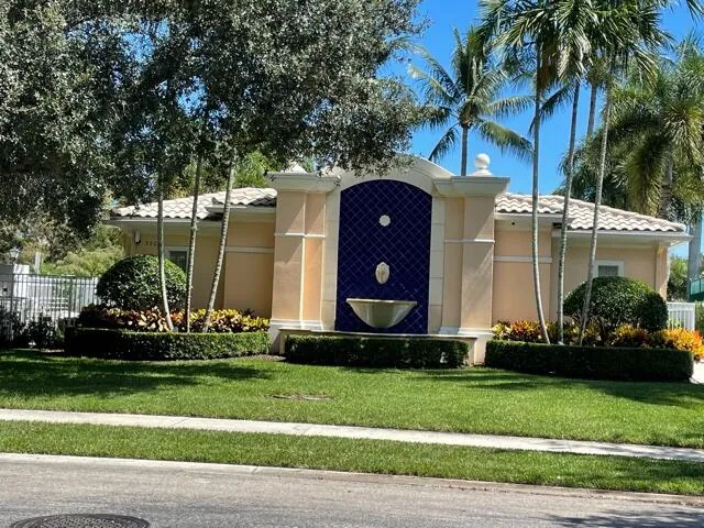 a view of a swimming pool with lounge chair