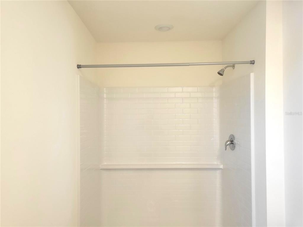 6534 Southwest 82nd Loop Ocala, FL 34476 - Photo 13 of 13 a bathroom with a shower