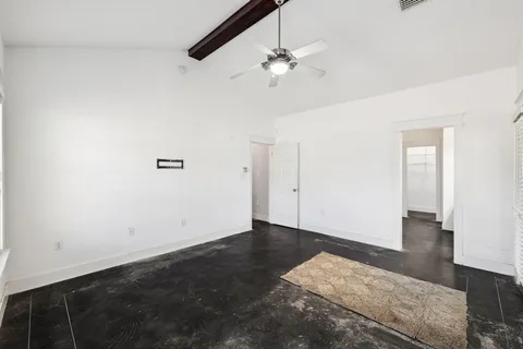 a kitchen with stainless steel appliances granite countertop a stove and a refrigerator