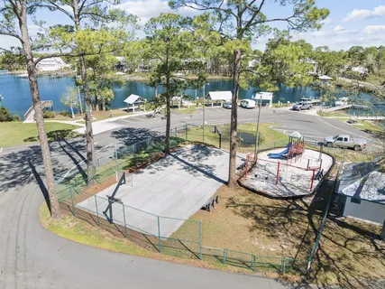 a view of a balcony with outdoor seating