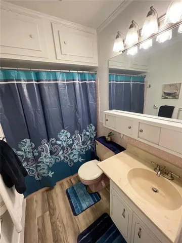 a bathroom with a sink and mirror