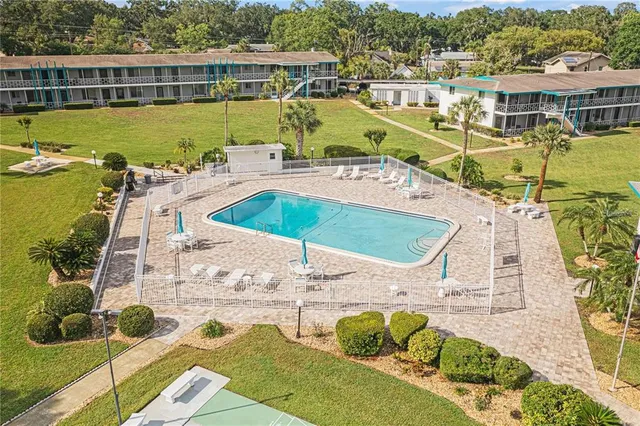a view of a swimming pool with an ocean view