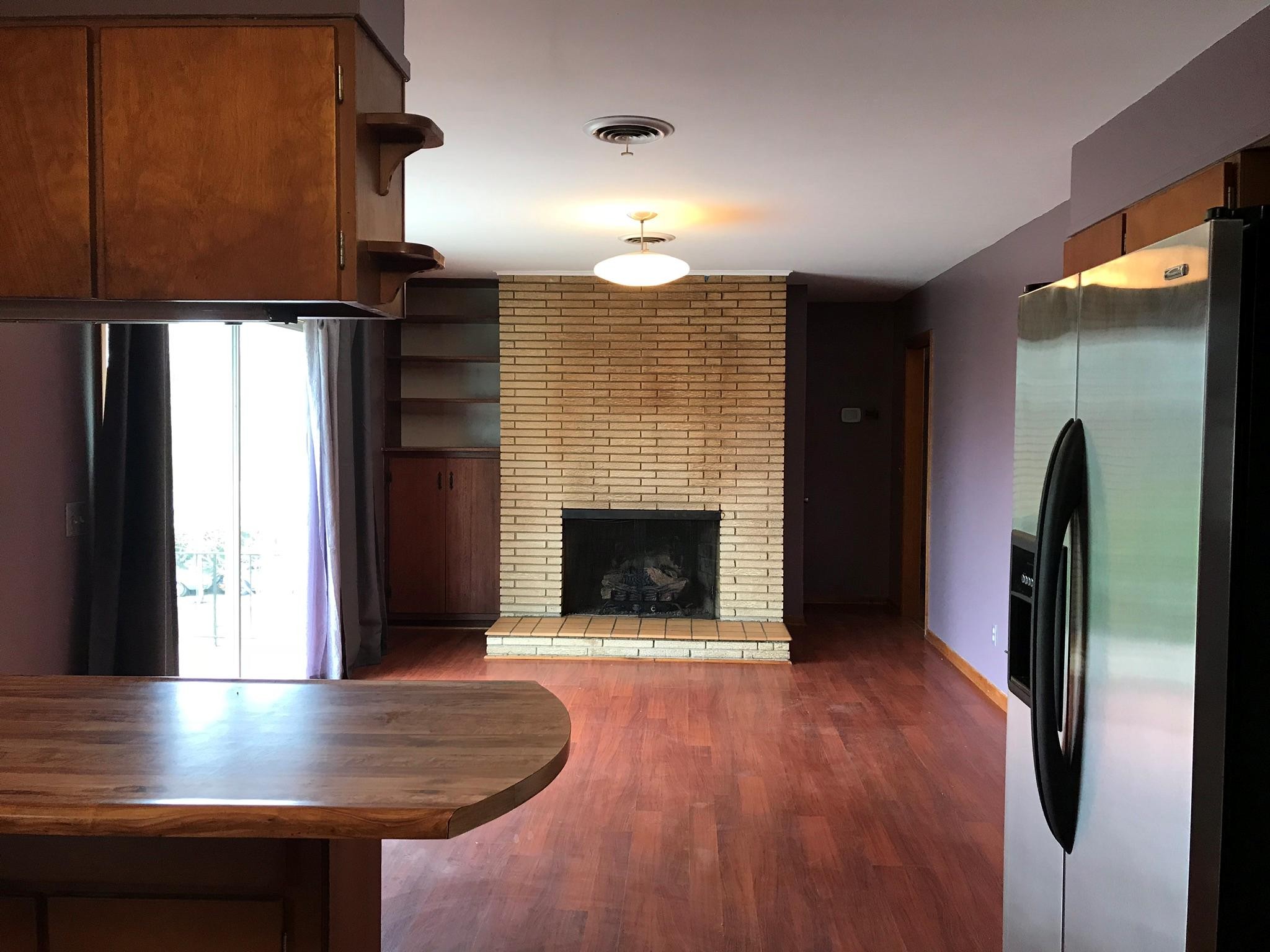 150 North Seneca Road Oak Ridge, TN 37830 - Photo 7 of 23 a view of kitchen with furniture fire place and refrigerator