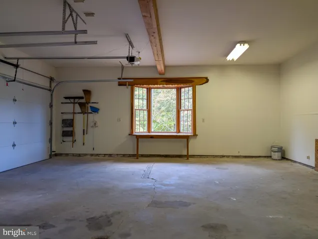 a bathroom with a shower and a sink
