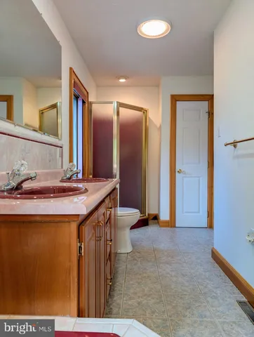 a view of an empty room with a large window