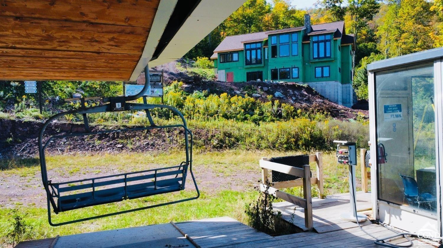 248 Club Road Windham, NY 12496 - Photo 4 of 9 a view of a bench in the patio