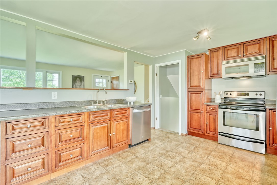 1815 Woodard Road Webster, NY 14580 - Photo 15 of 45 MORE OF THE KITCHEN and BEAUTIFUL CHERRY CABINETRY