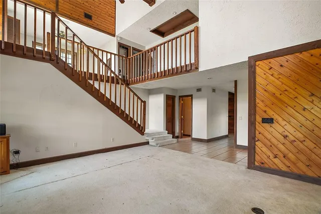 a bathroom with a sink and a shower curtain