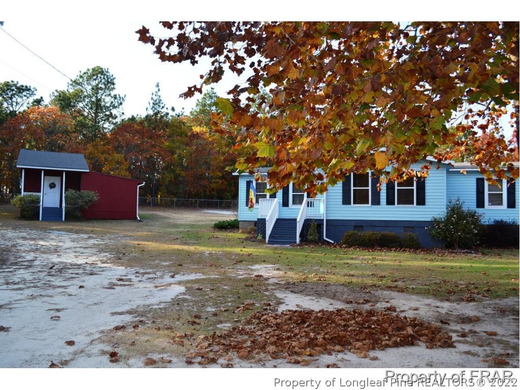 105 Beard Road Raeford, NC 28376 - Photo 1 of 29 a view of a house with a yard