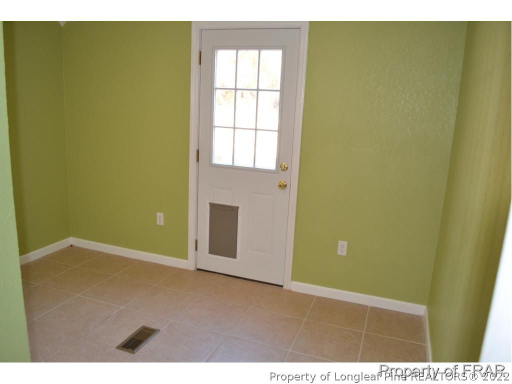 105 Beard Road Raeford, NC 28376 - Photo 12 of 29 a view of an empty room with a window