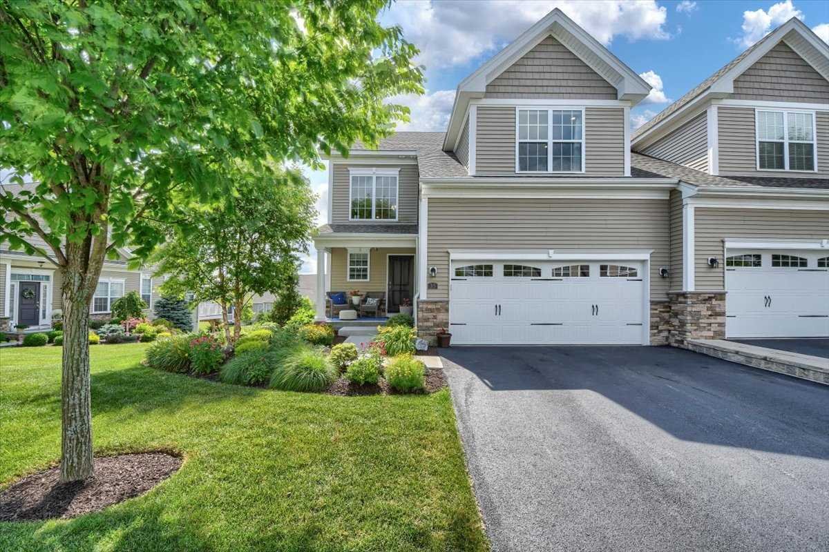 a house view with a garden space