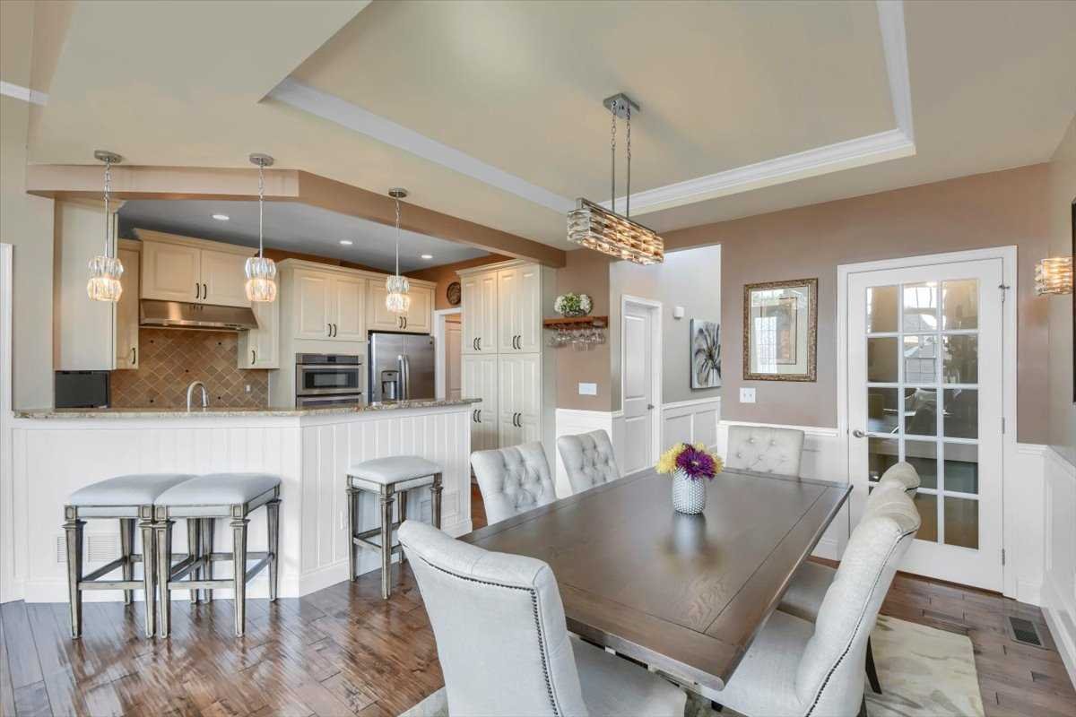35 Farmington Road Wappinger, NY 12590 - Photo 7 of 28 a living room with fireplace a table and chairs