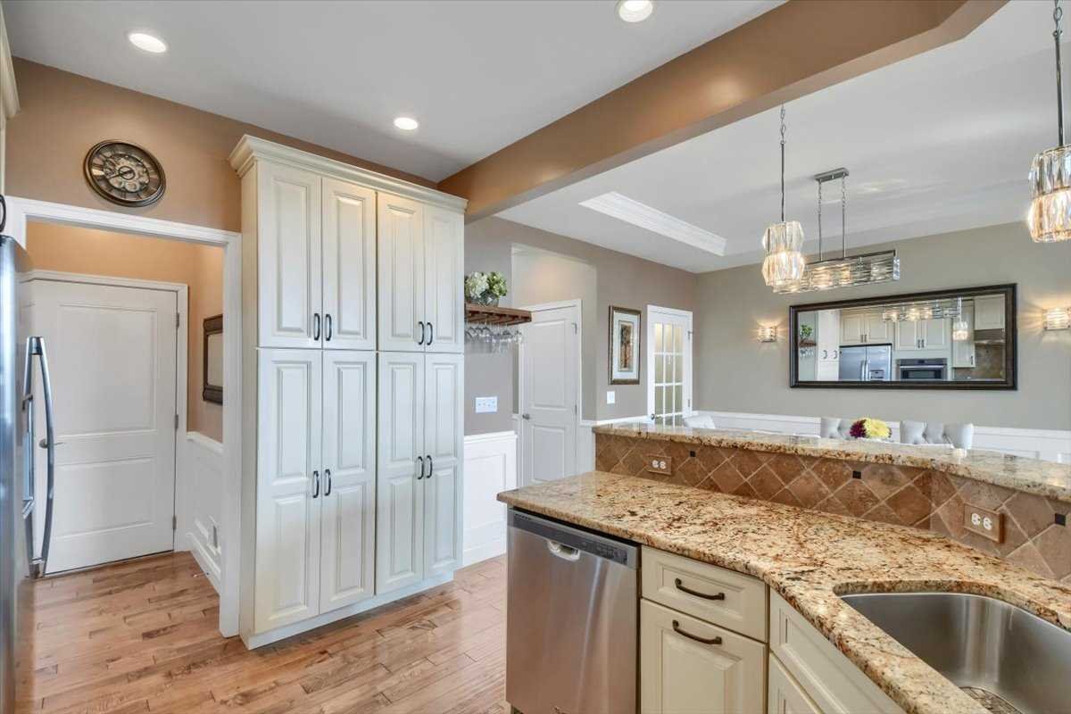 35 Farmington Road Wappinger, NY 12590 - Photo 9 of 28 a view of a kitchen cabinets a sink and dishwasher with wooden floor