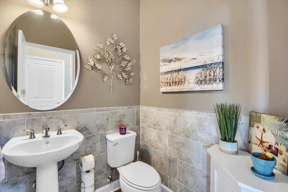 35 Farmington Road Wappinger, NY 12590 - Photo 10 of 28 a bathroom with a sink mirror and toilet