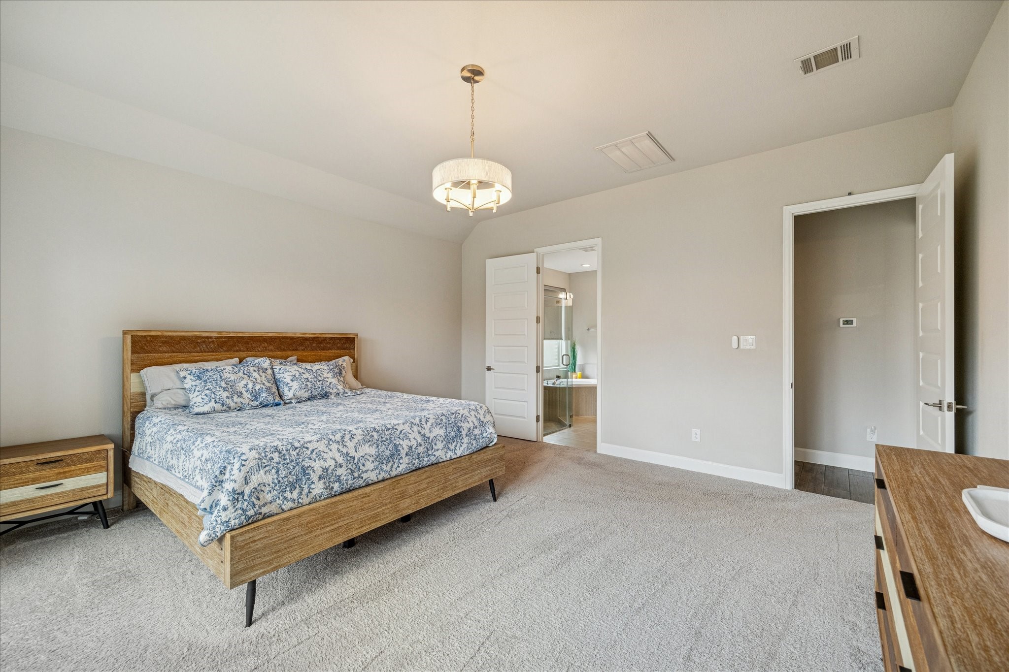 7354 Mount Greylock Loop Porter, TX 77365 - Photo 13 of 18 a spacious bedroom with a bed and ceiling fan