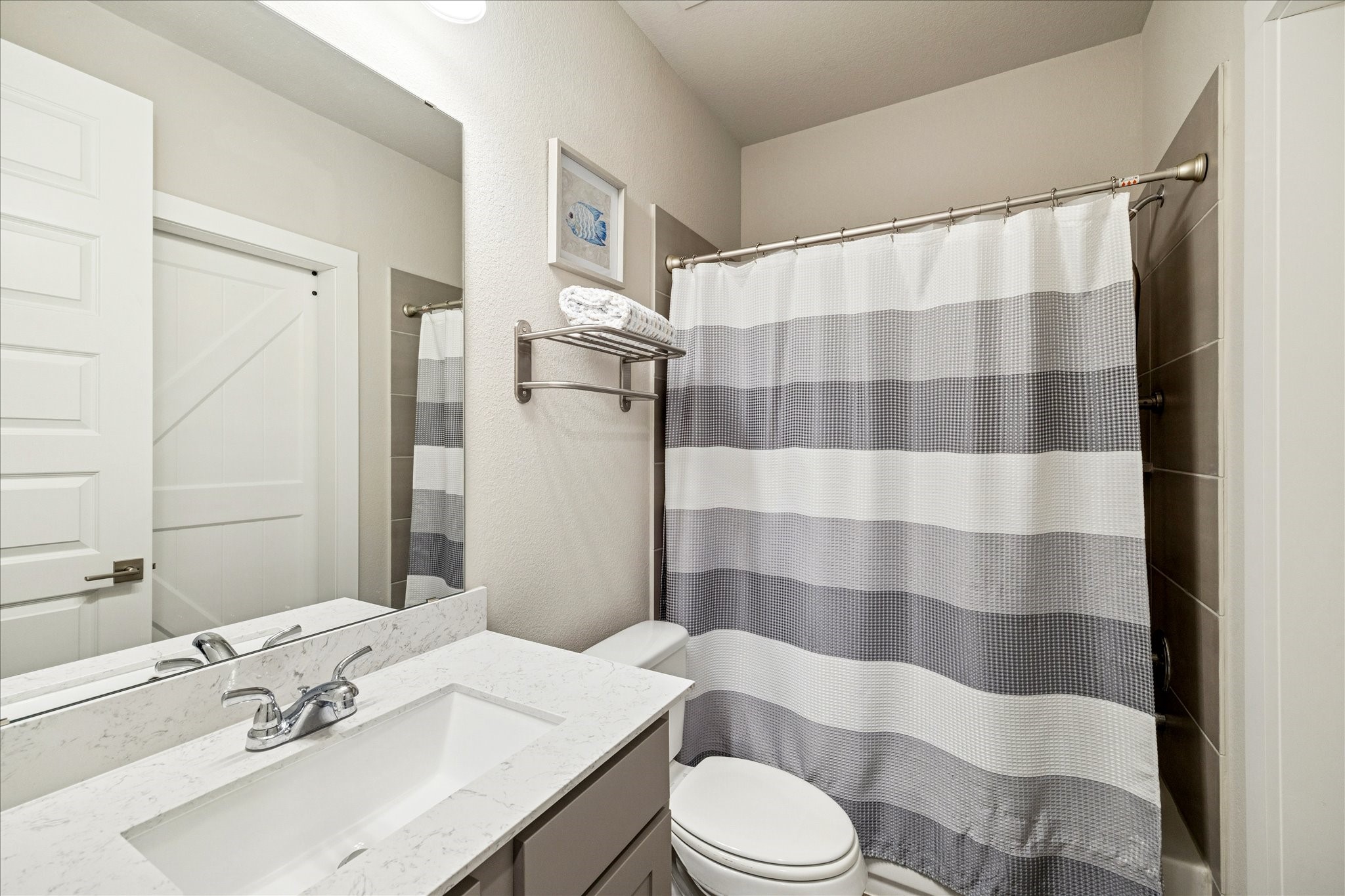 7354 Mount Greylock Loop Porter, TX 77365 - Photo 18 of 18 a bathroom with a sink a toilet a shower and a mirror