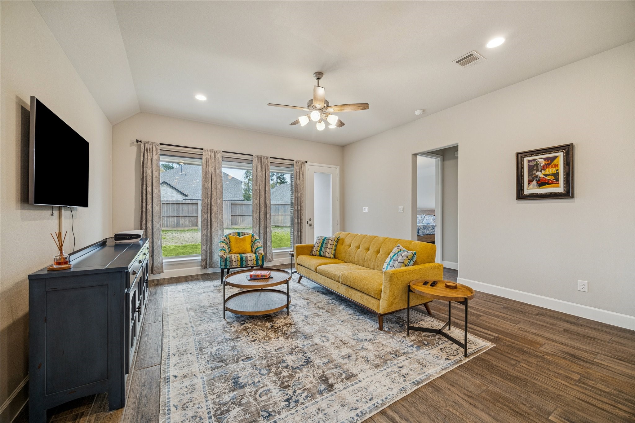 7354 Mount Greylock Loop Porter, TX 77365 - Photo 2 of 18 a living room with furniture and a flat screen tv