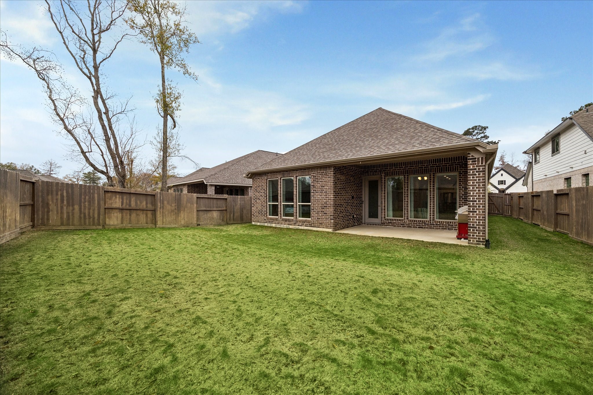 7354 Mount Greylock Loop Porter, TX 77365 - Photo 5 of 18 a view of a house with a backyard