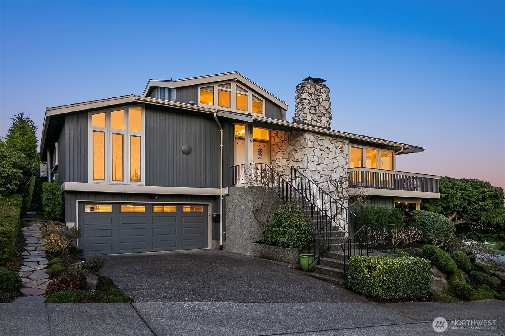 2016 Constance Drive West Seattle, WA 98199 - Photo 1 of 40 a front view of a house with trees