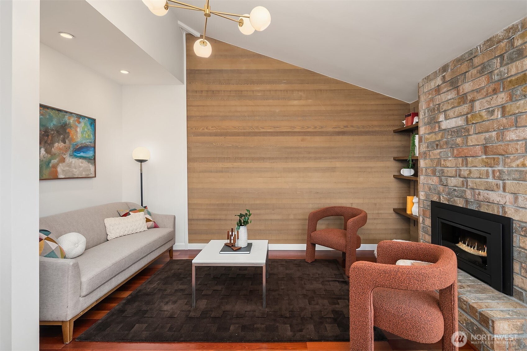 2016 Constance Drive West Seattle, WA 98199 - Photo 15 of 40 a living room with furniture and a fireplace