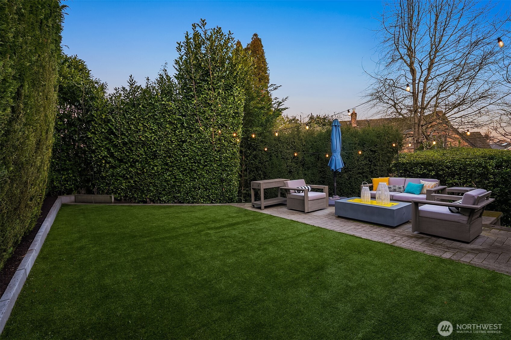 2016 Constance Drive West Seattle, WA 98199 - Photo 18 of 40 a view of a couches in patio and a yard