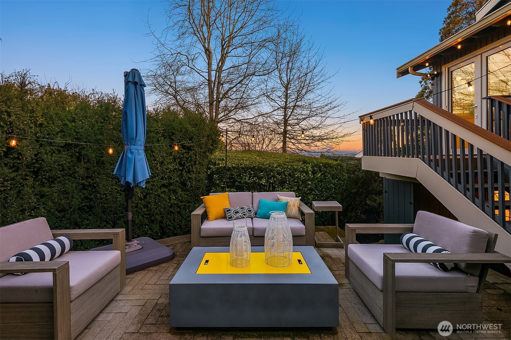 2016 Constance Drive West Seattle, WA 98199 - Photo 19 of 40 a view of a swimming pool with a couches and wooden floor