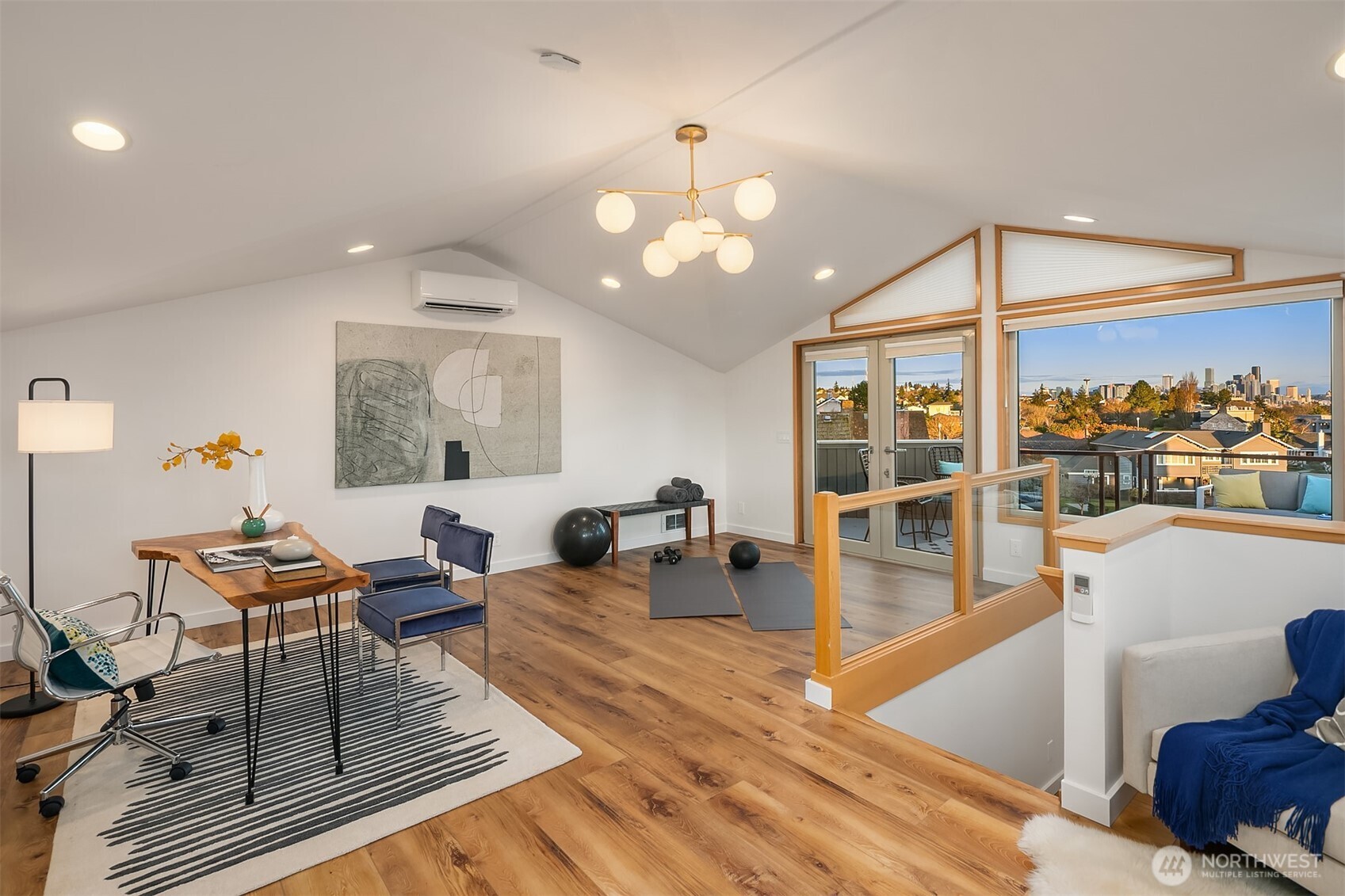 2016 Constance Drive West Seattle, WA 98199 - Photo 26 of 40 a living room with furniture a rug potted plant and a large window