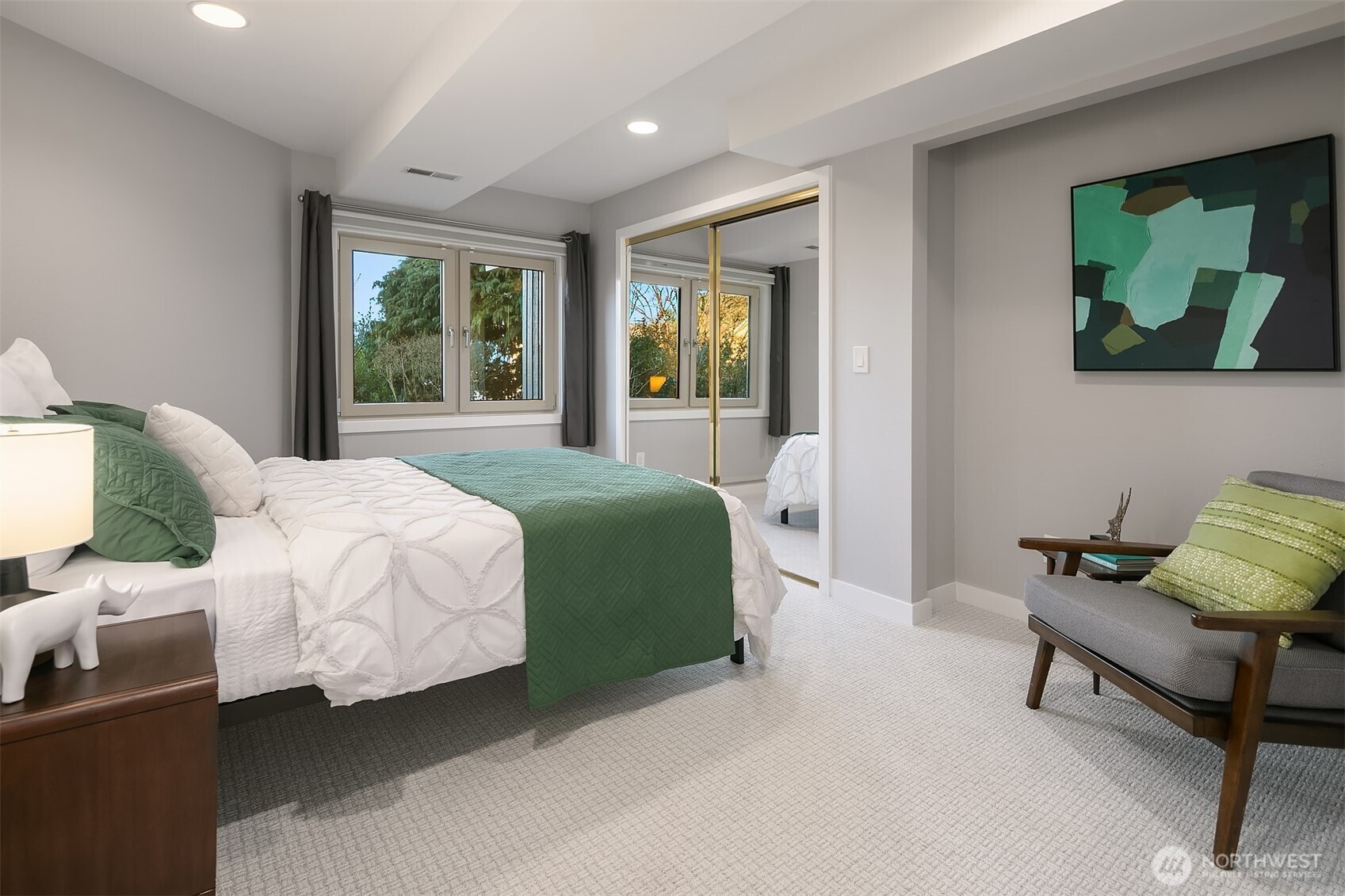 2016 Constance Drive West Seattle, WA 98199 - Photo 38 of 40 a bedroom with a bed table and window