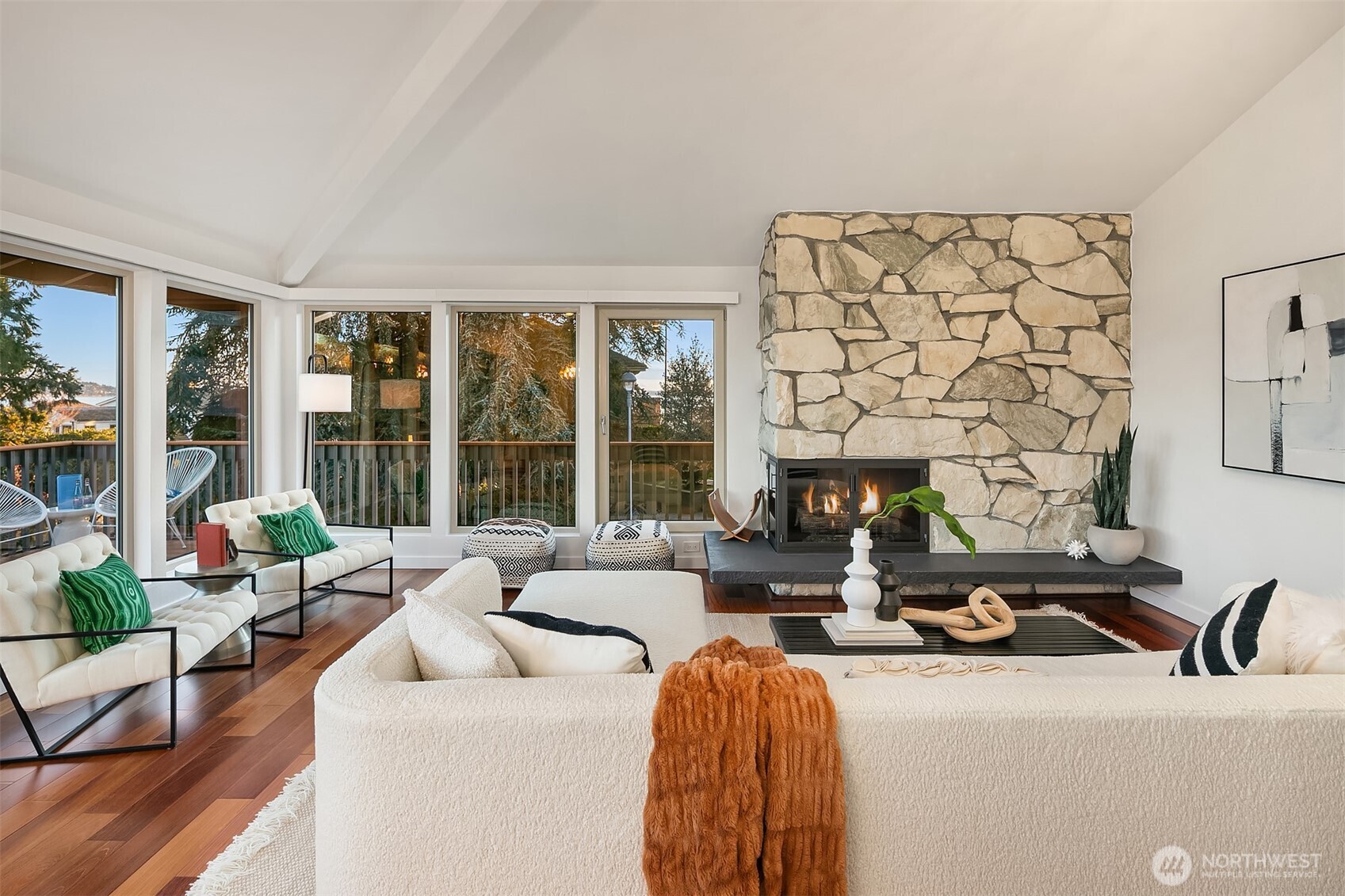 2016 Constance Drive West Seattle, WA 98199 - Photo 6 of 40 a living room with furniture a fireplace and large windows