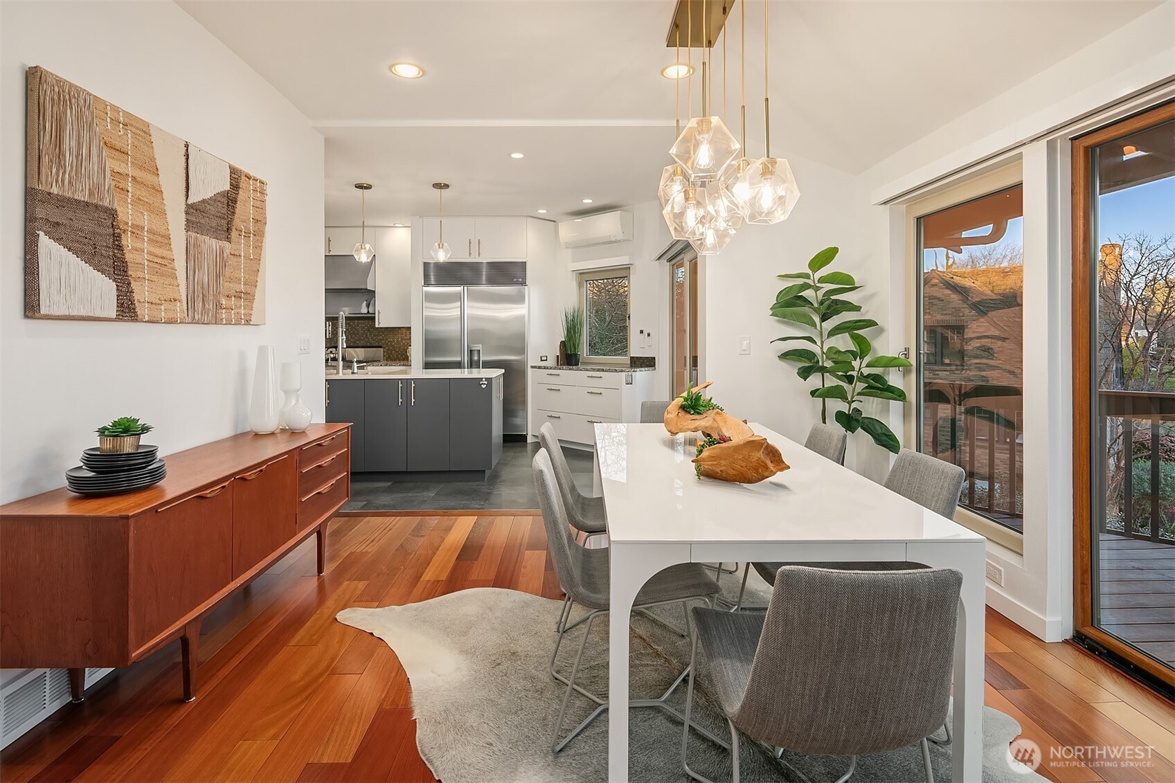 2016 Constance Drive West Seattle, WA 98199 - Photo 9 of 40 a dining room with furniture and a chandelier