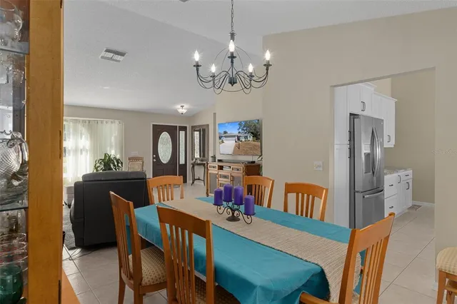 a bathroom with a granite countertop sink toilet a mirror and shower