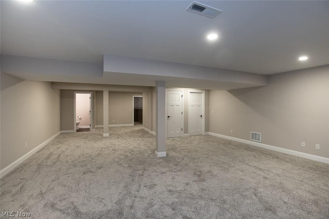34286 Brookside Lane North Ridgeville, OH 44039 - Photo 46 of 50 Finished below grade area featuring carpet flooring and recessed lighting