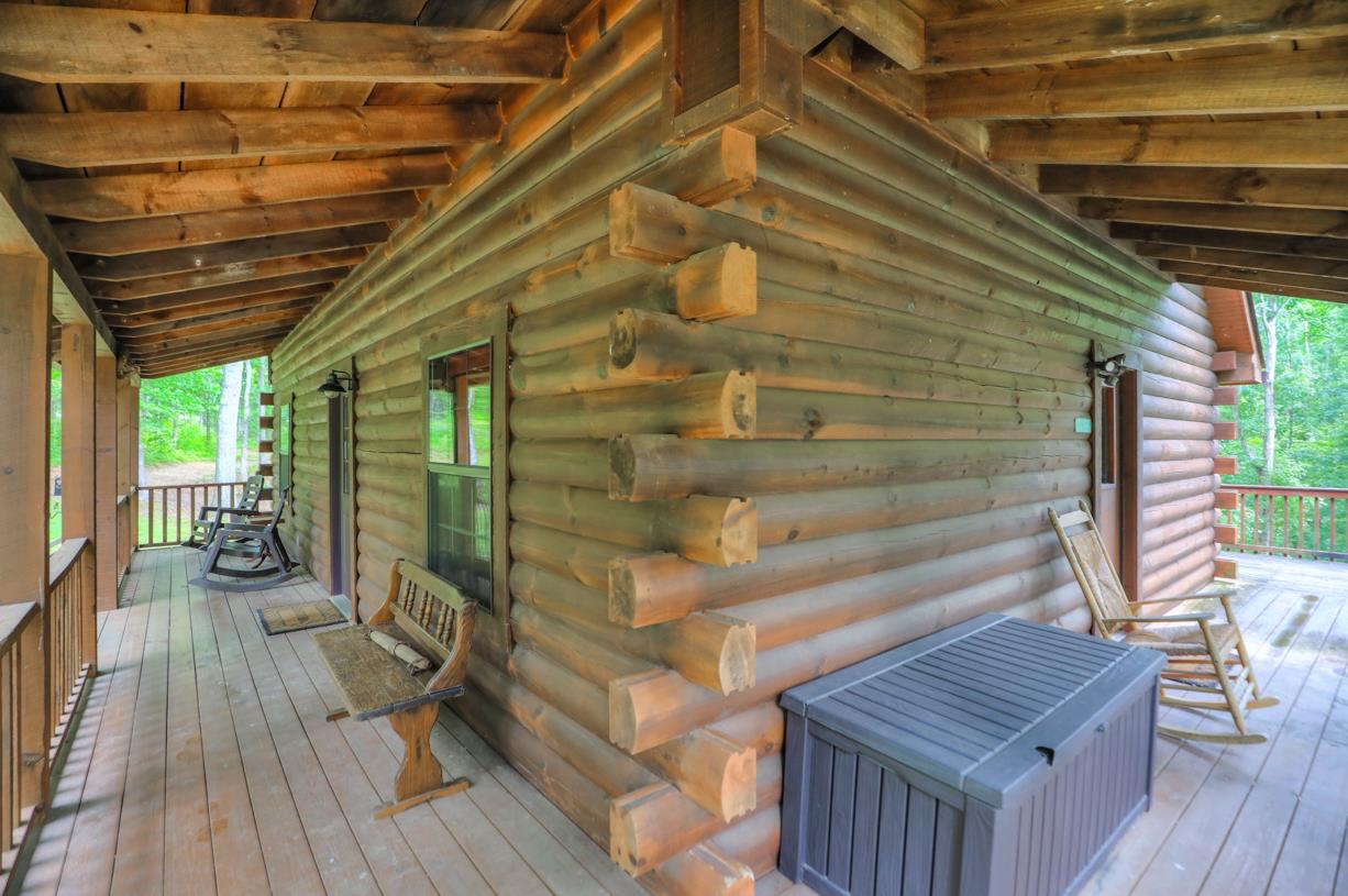 6407 Tom Rail Road Primm Springs, TN 38476 - Photo 4 of 23 a view of a balcony with wooden floor