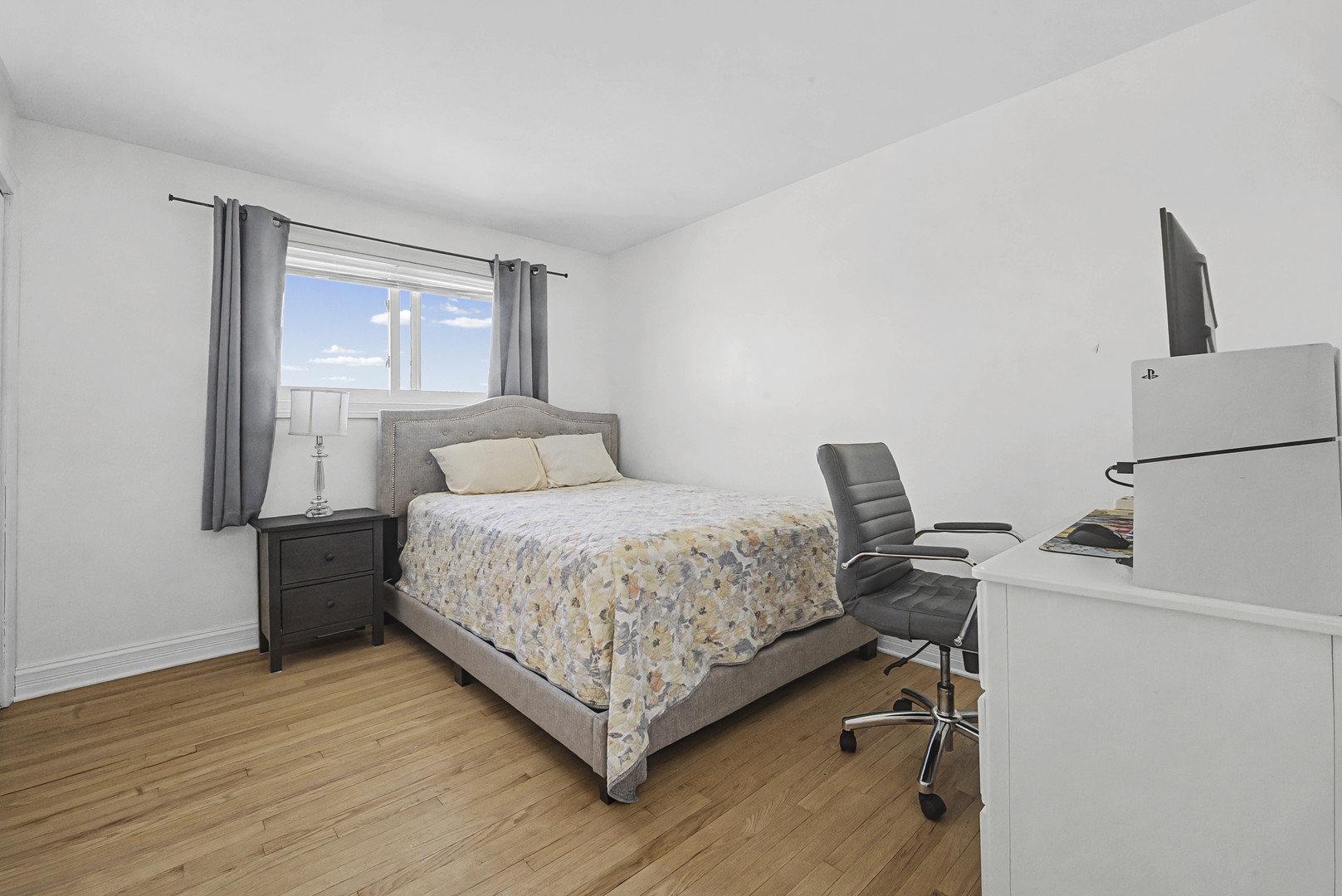 102 South Adeline Avenue Addison, IL 60101 - Photo 11 of 20 a bedroom with a bed and a window