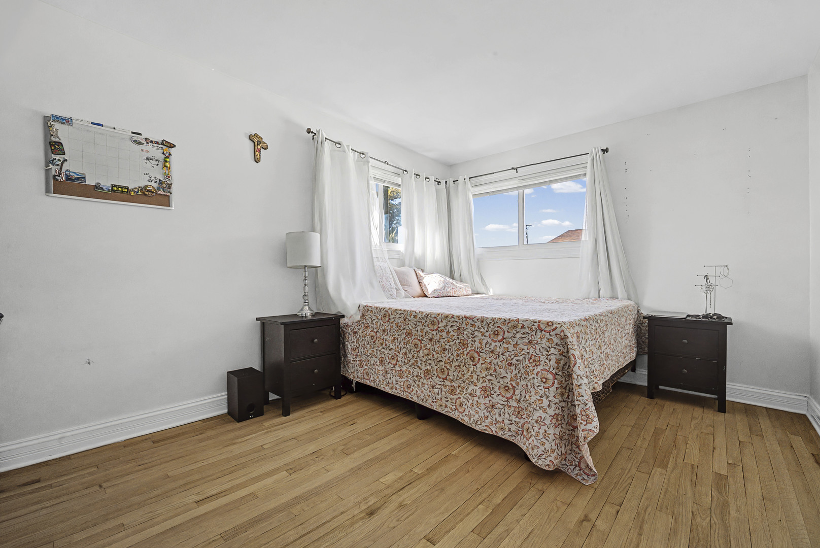 102 South Adeline Avenue Addison, IL 60101 - Photo 13 of 20 a bedroom with a bed and wooden floor