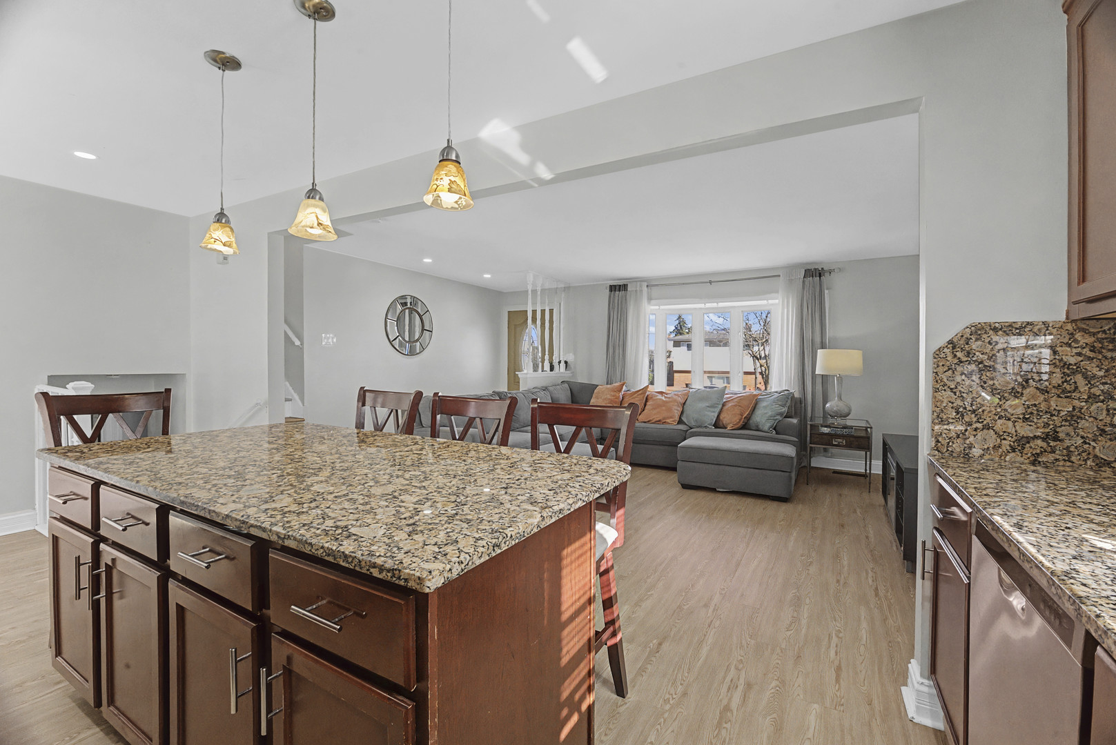 102 South Adeline Avenue Addison, IL 60101 - Photo 6 of 20 a living room with furniture and wooden floor