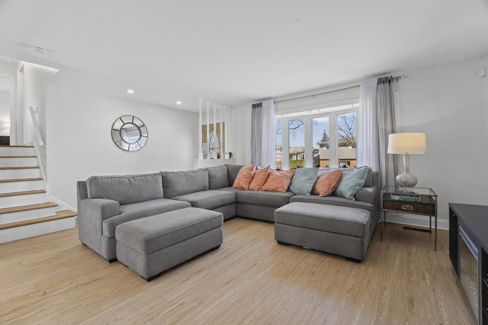 102 South Adeline Avenue Addison, IL 60101 - Photo 7 of 20 a living room with furniture and a wooden floor